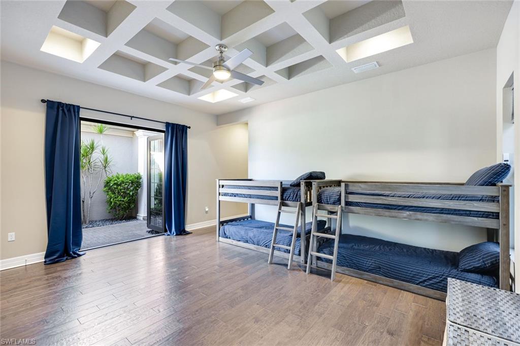 4394 Caldera Circle Naples, FL 34119 - Photo 25 of 39 a view of a livingroom with furniture window and wooden floor