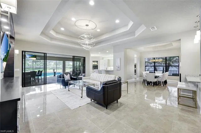 a living room with furniture and a view of living room
