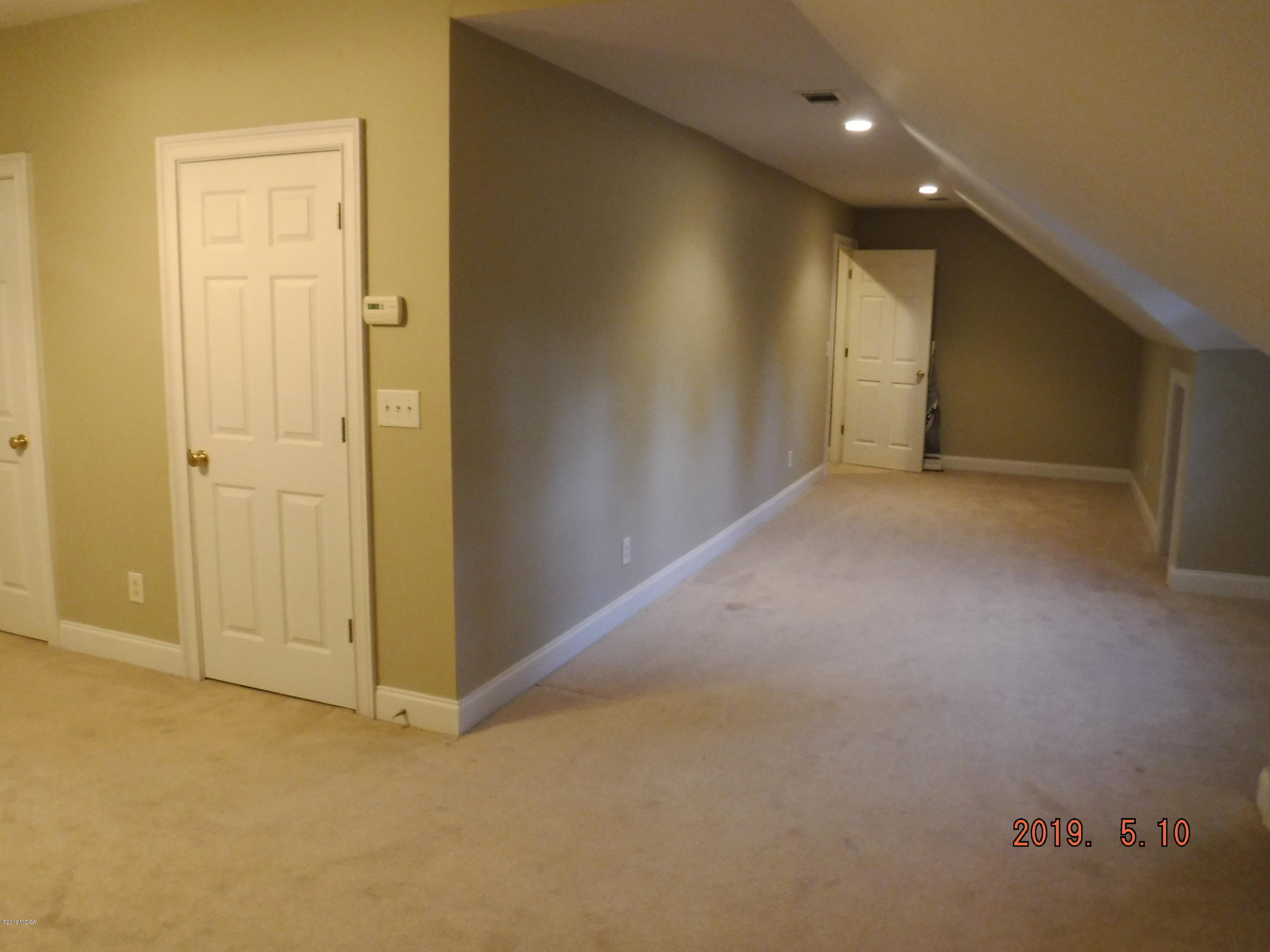 755 Charles Johnson Road Forsyth, GA 31029 - Photo 17 of 35 a view of an empty room