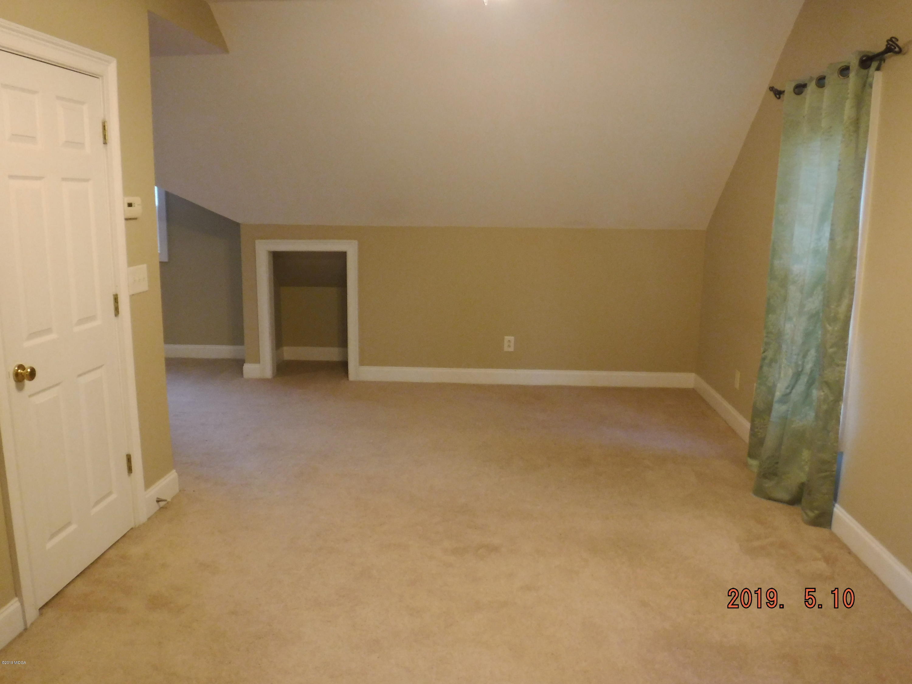 755 Charles Johnson Road Forsyth, GA 31029 - Photo 19 of 35 a view of an empty room
