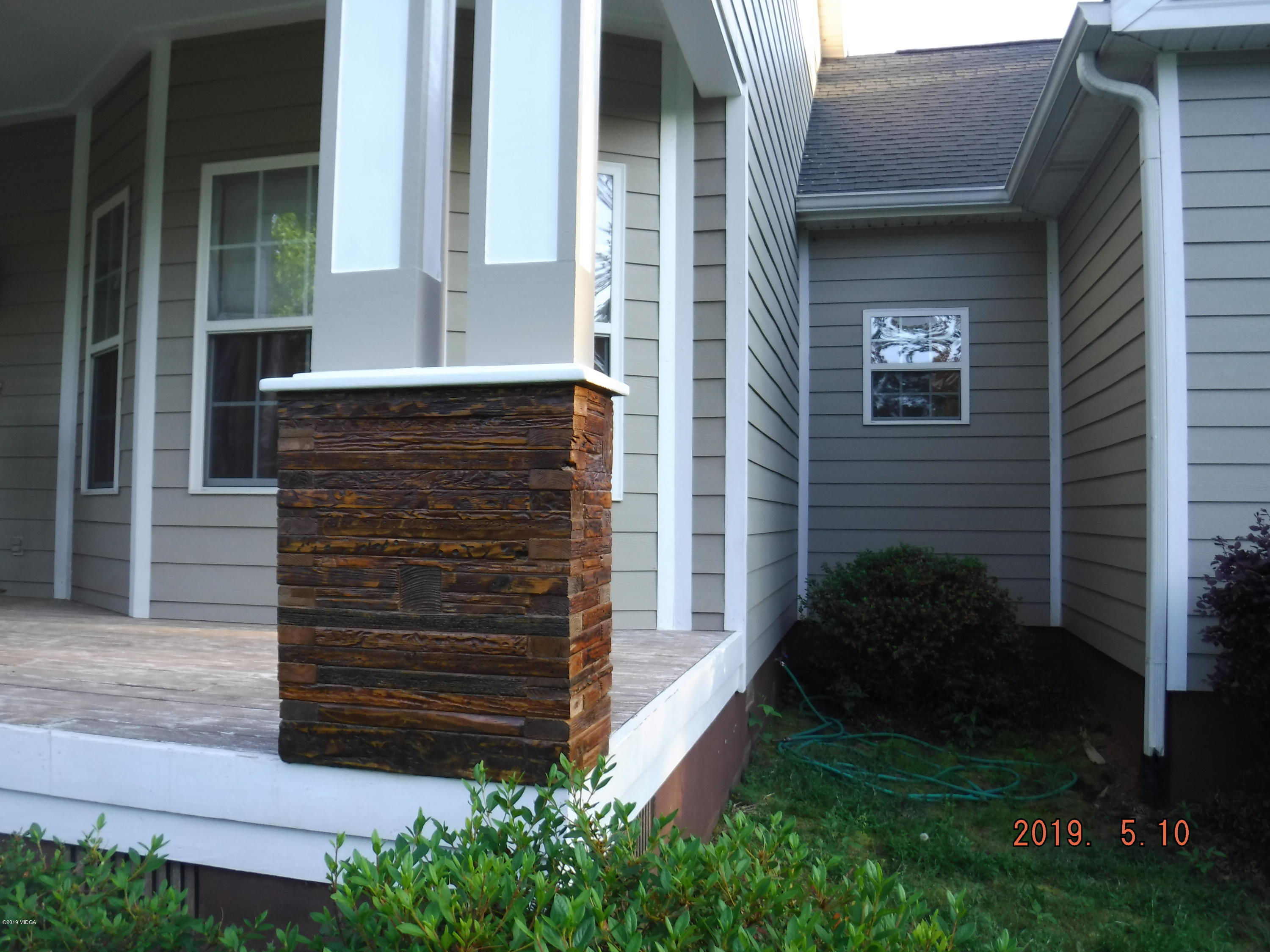 755 Charles Johnson Road Forsyth, GA 31029 - Photo 27 of 35 a view of front door of house