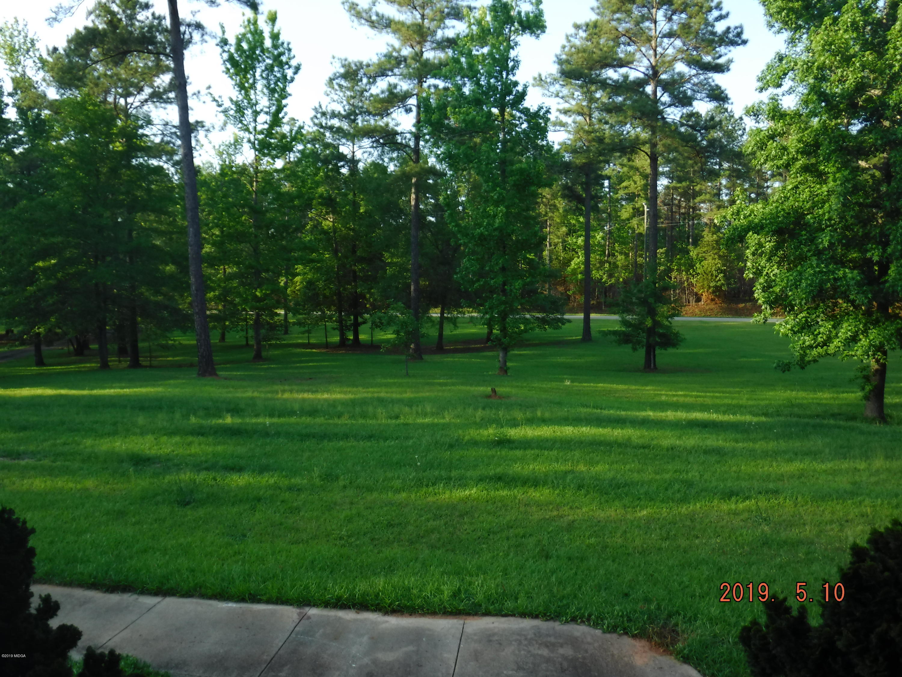 755 Charles Johnson Road Forsyth, GA 31029 - Photo 29 of 35 a view of a park with large trees