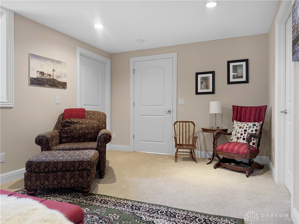 4096 Middle Urbana Road Urbana, OH 43078 - Photo 45 of 96 This cozy bedroom features soft carpeting and recessed lighting, creating an inviting atmosphere for relaxation.