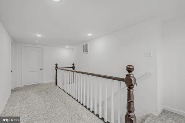 a view of a hallway with a small space