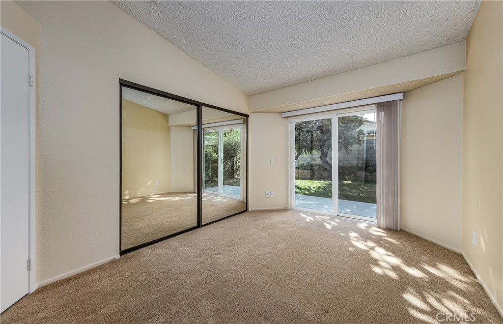 1954 Union Street Colton, CA 92324 - Photo 12 of 32 a view of an empty room with glass door