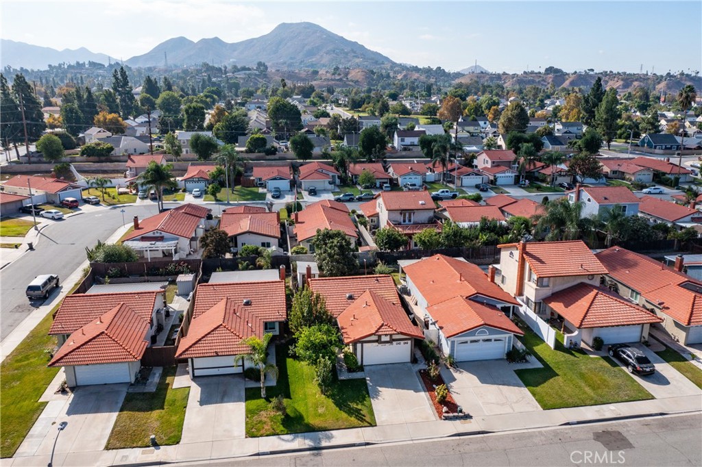 1954 Union Street Colton, CA 92324 - Photo 23 of 32 an aerial view of residential houses with outdoor space and parking