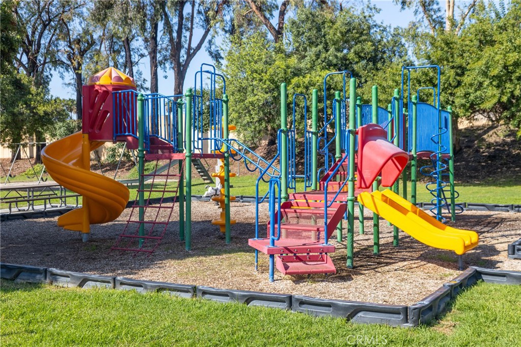 1954 Union Street Colton, CA 92324 - Photo 26 of 32 a view of playground with a slide and swing