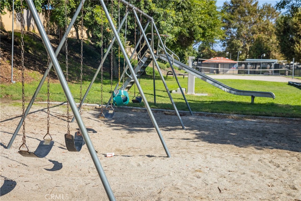 1954 Union Street Colton, CA 92324 - Photo 28 of 32 a view of a swimming pool with a patio and wooden fence