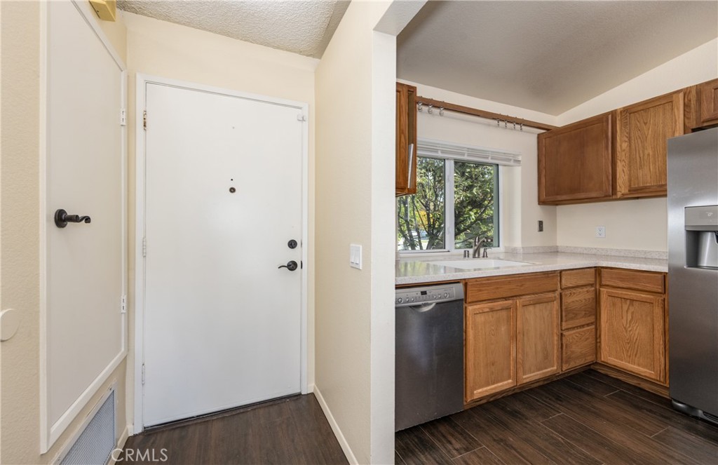 1954 Union Street Colton, CA 92324 - Photo 4 of 32 a kitchen with stainless steel appliances granite countertop a refrigerator and a sink