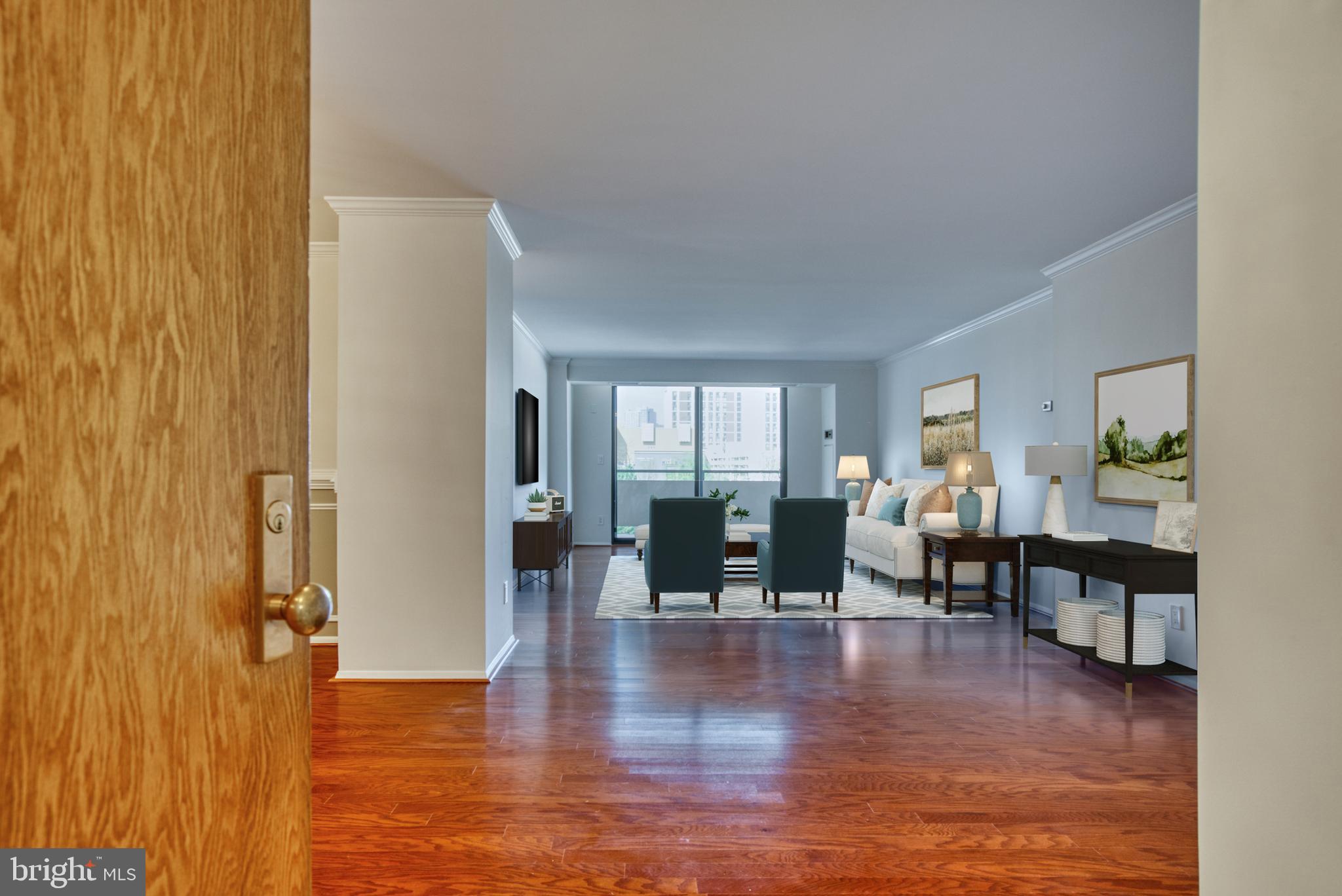 1800 Old Meadow Road, Unit 1006 McLean, VA 22102 - Photo 4 of 63 a living room with furniture window and wooden floor