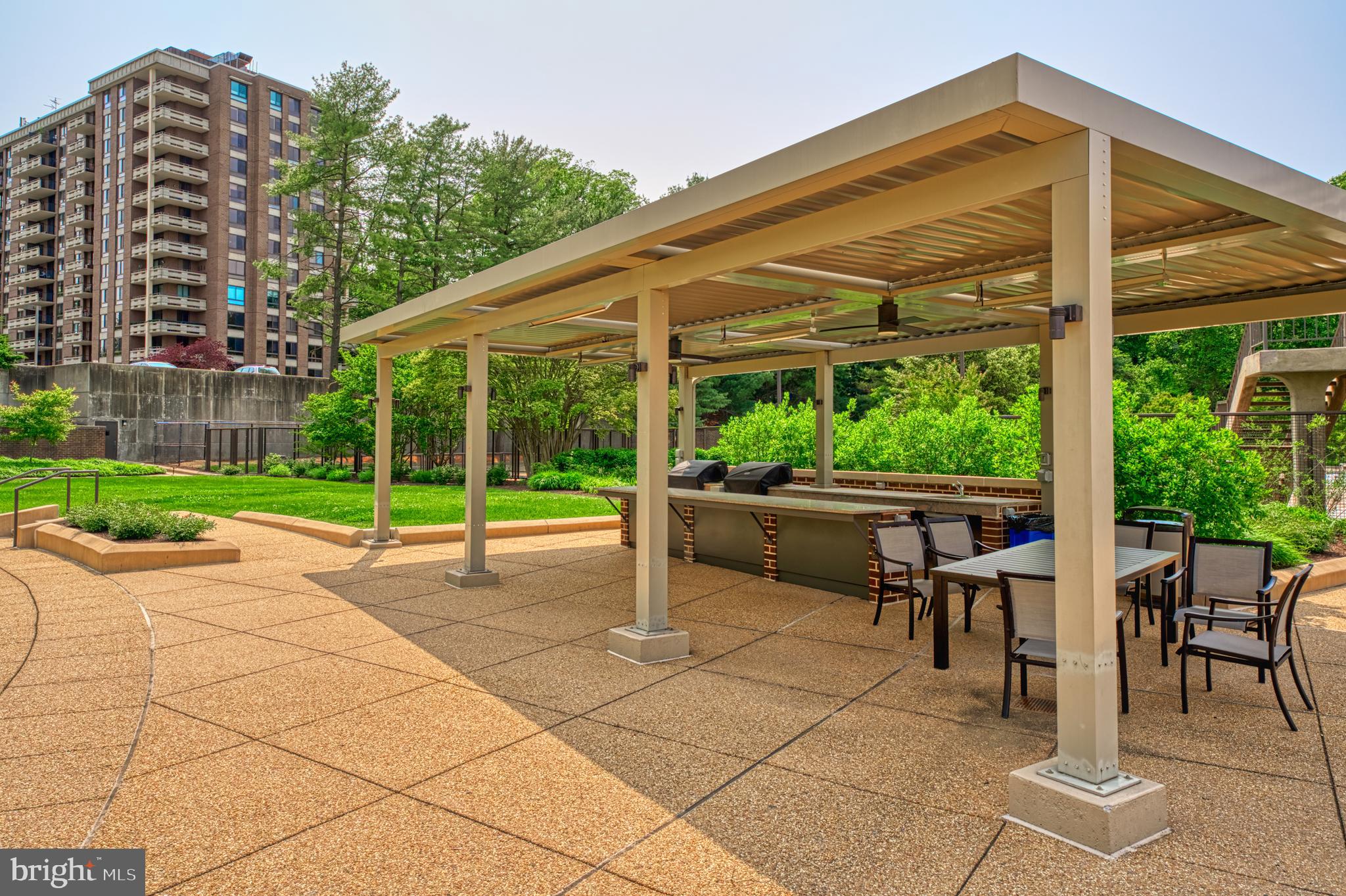 1800 Old Meadow Road, Unit 1006 McLean, VA 22102 - Photo 46 of 63 a house view with a sitting space and garden view