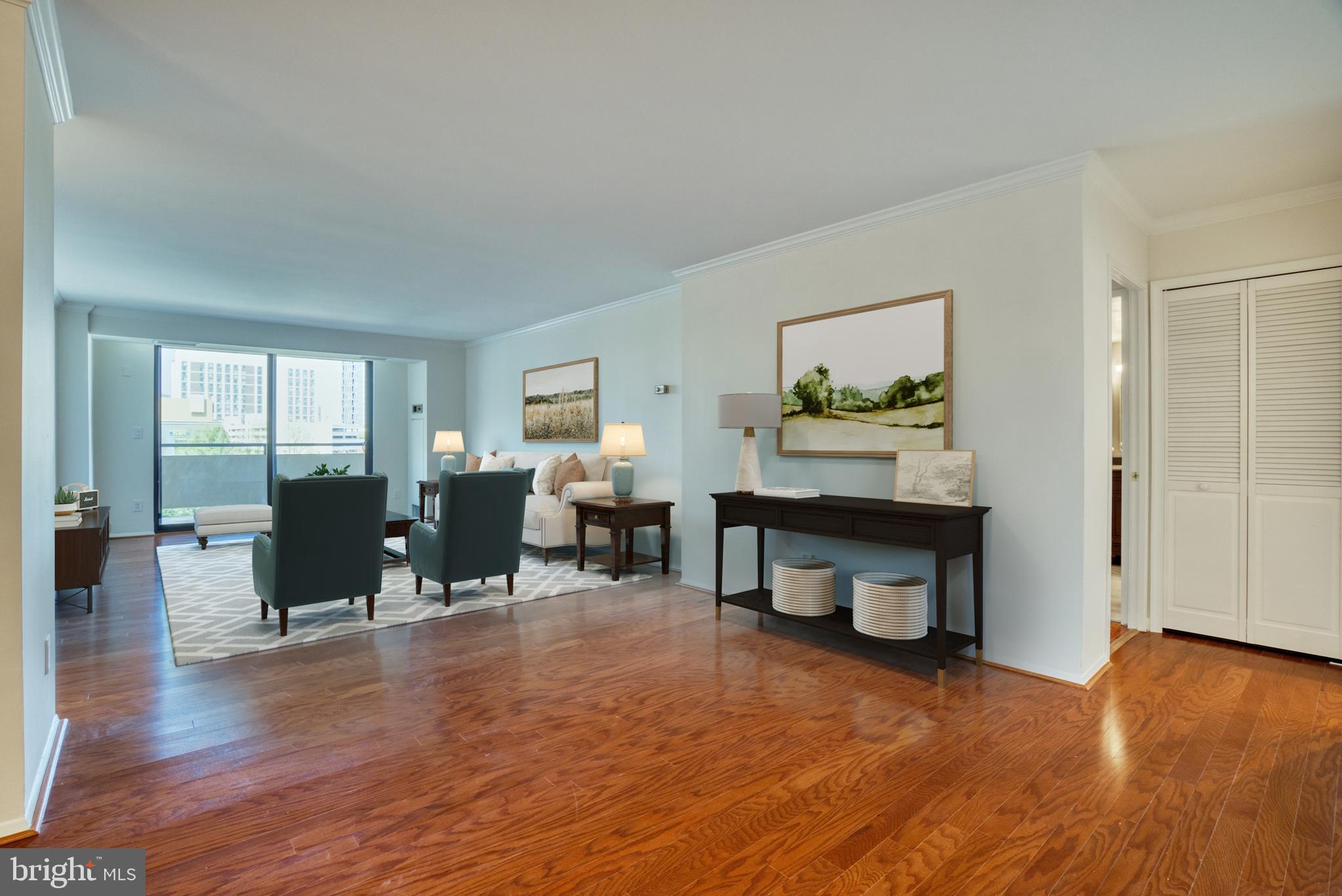 1800 Old Meadow Road, Unit 1006 McLean, VA 22102 - Photo 5 of 63 a living room with furniture and a wooden floor