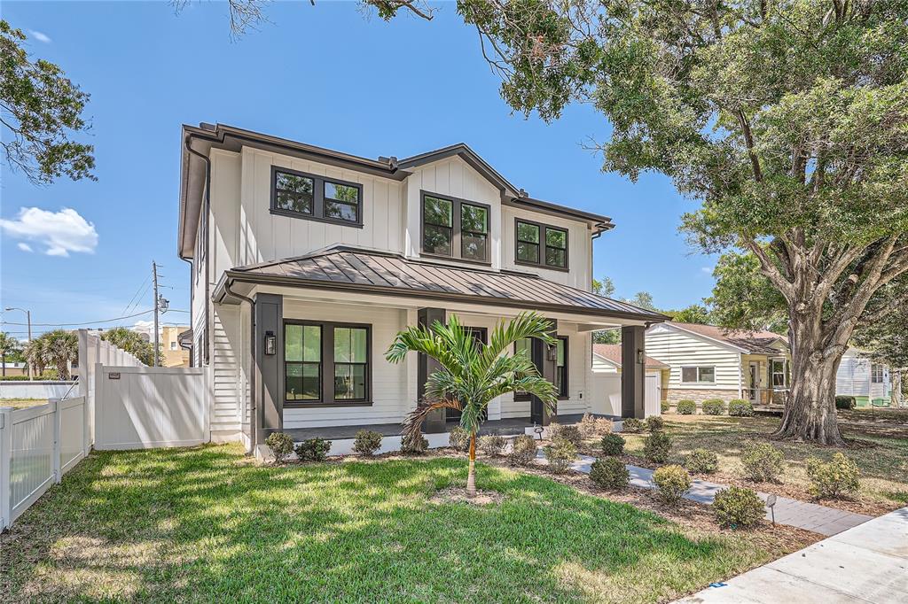 325 33rd Avenue North St. Petersburg, FL 33704 - Photo 3 of 57 a house that has a tree in front of the house