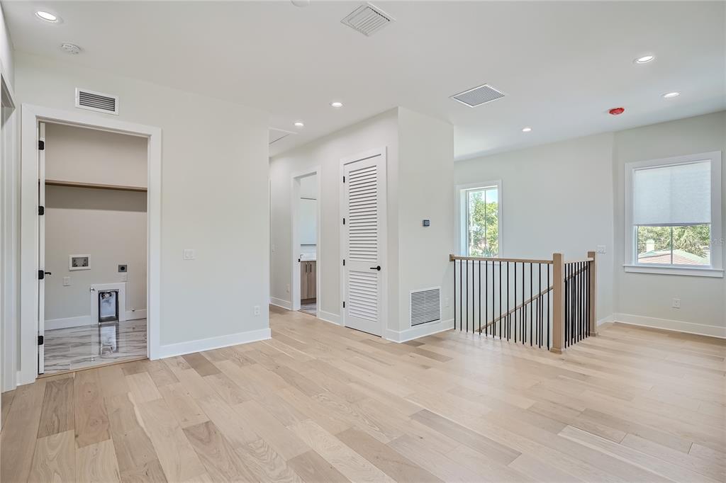 325 33rd Avenue North St. Petersburg, FL 33704 - Photo 35 of 57 a view of a hallway with entryway and stairs