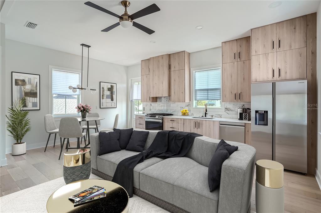 325 33rd Avenue North St. Petersburg, FL 33704 - Photo 46 of 57 a living room with furniture a window and kitchen view