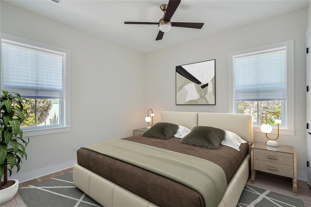 325 33rd Avenue North St. Petersburg, FL 33704 - Photo 49 of 57 a bedroom with a bed and a painting on the wall