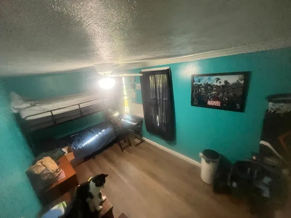 a room with furniture and a projector