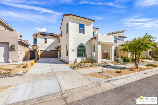 a building exterior with furniture