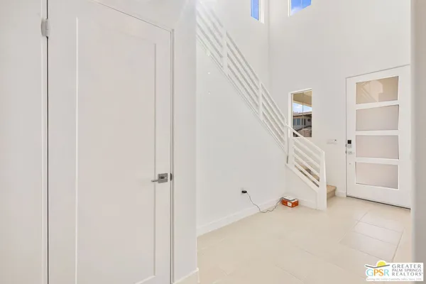 a view of an entryway with staircase