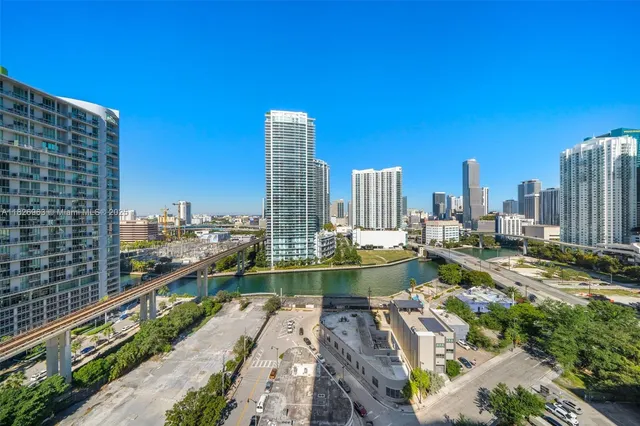 a view of a city with tall buildings