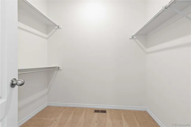 a view of small space with racks on the wall