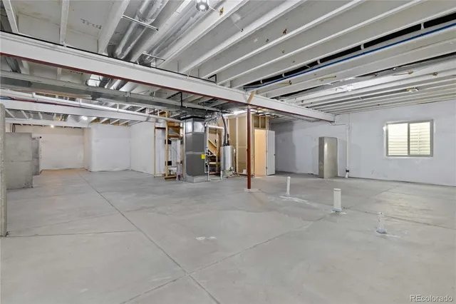 a view of a brick house with large windows