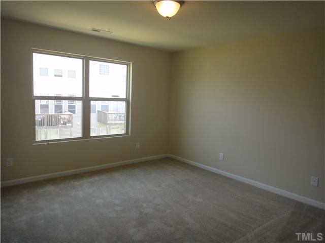 4304 Hargrove Road Raleigh, NC 27604 - Photo 5 of 10 an empty room with a window