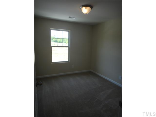 4304 Hargrove Road Raleigh, NC 27604 - Photo 8 of 10 a view of a window in an empty room