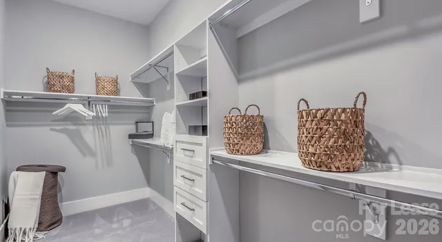 a room with furniture and a rug