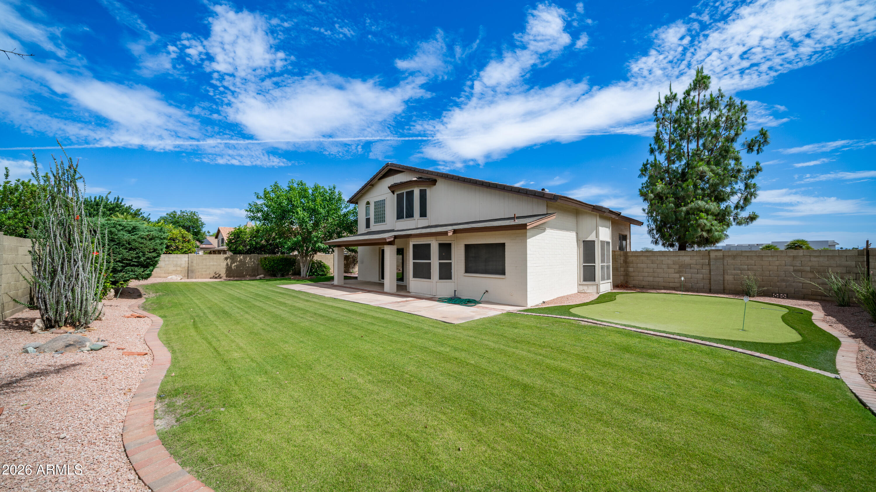 6620 West Redfield Road Glendale, AZ 85306 - Photo 3 of 33 a view of a house with a yard