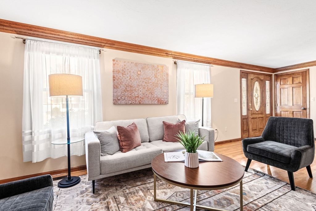 2 Heritage Way Bellingham, MA 02019 - Photo 4 of 31 a living room with furniture and a large window