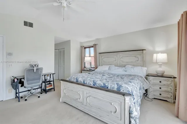 a view of a balcony with chairs