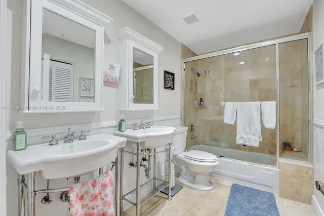 a view of a swimming pool with chairs