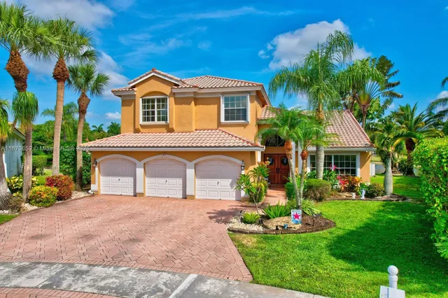 a living room with lots of furniture and a flat screen tv