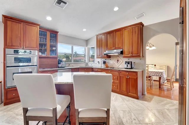 a bedroom with a bed and a table