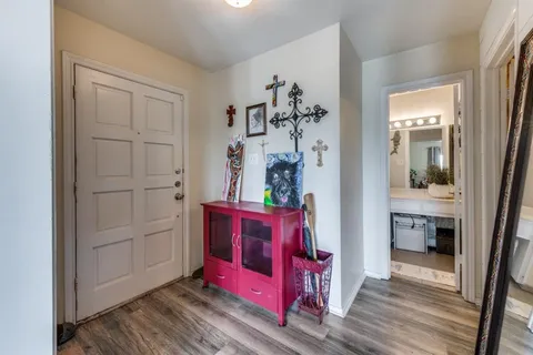 a view of a hallway and closet