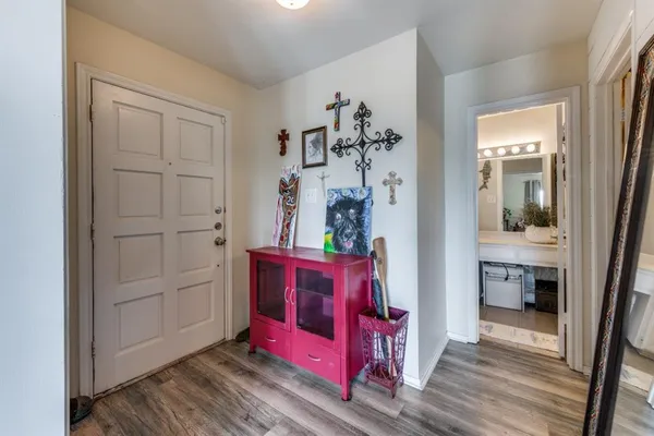 a view of a hallway and closet