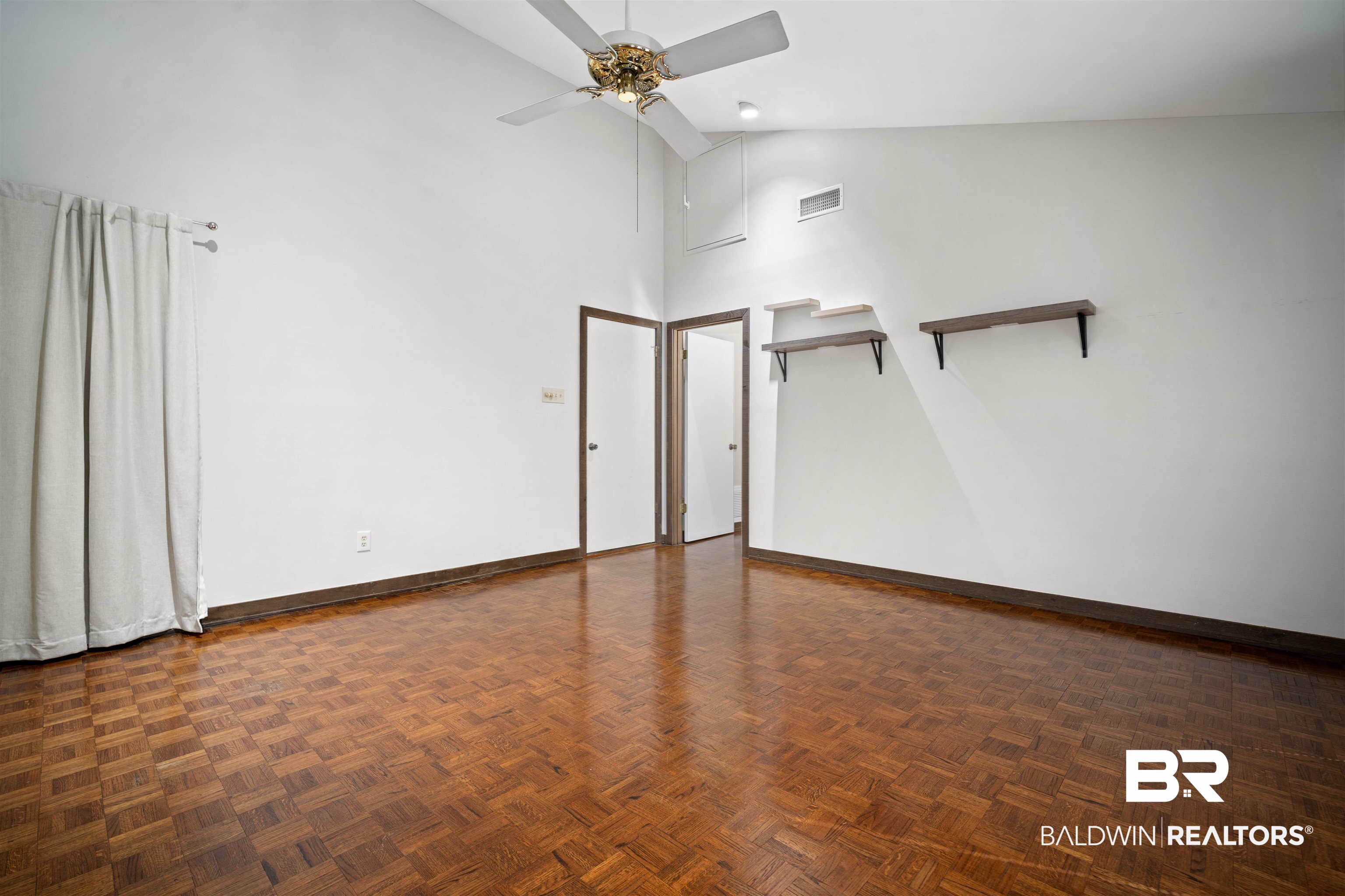 7912 Yorkhaven Road Mobile, AL 36695 - Photo 16 of 41 Empty room featuring high vaulted ceiling and a ceiling fan