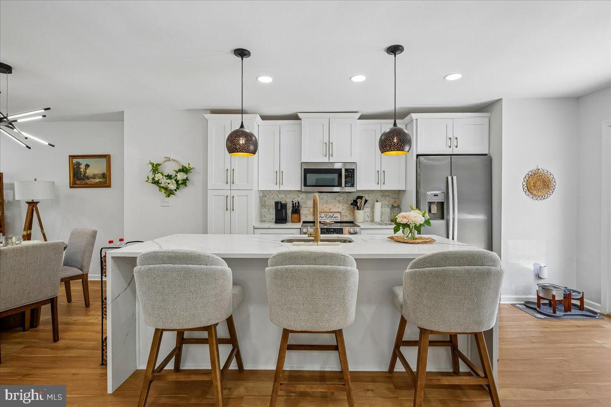 100 Rugby Fredericksburg, VA 22406 - Photo 22 of 41 Modern kitchen with stylish seating.