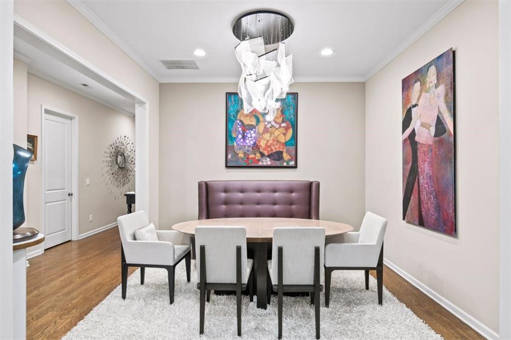5564 High Point Road Northeast Atlanta, GA 30342 - Photo 13 of 45 a view of a dining room with furniture and wooden floor