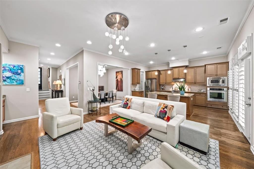 5564 High Point Road Northeast Atlanta, GA 30342 - Photo 4 of 45 a living room with furniture kitchen view and a table