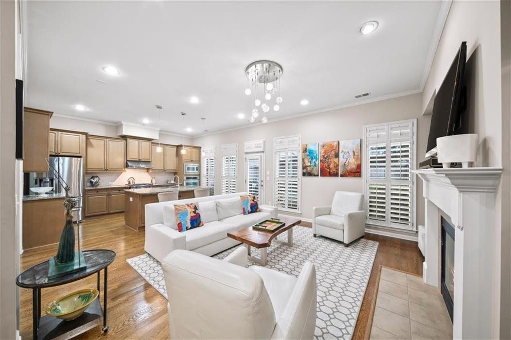 5564 High Point Road Northeast Atlanta, GA 30342 - Photo 5 of 45 a living room with furniture fireplace and flat screen tv