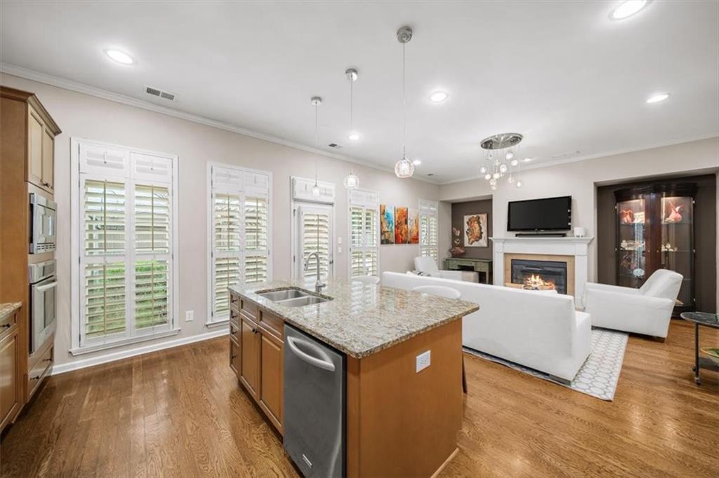 5564 High Point Road Northeast Atlanta, GA 30342 - Photo 9 of 45 a living room with furniture and a flat screen tv