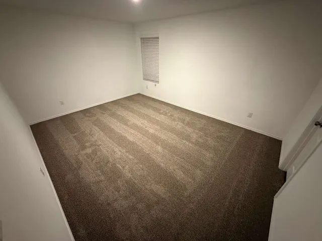 an empty room with a workbench