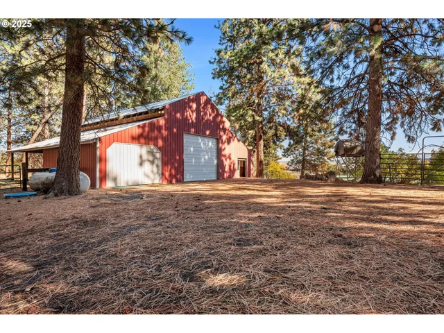 a view of a backyard of a house