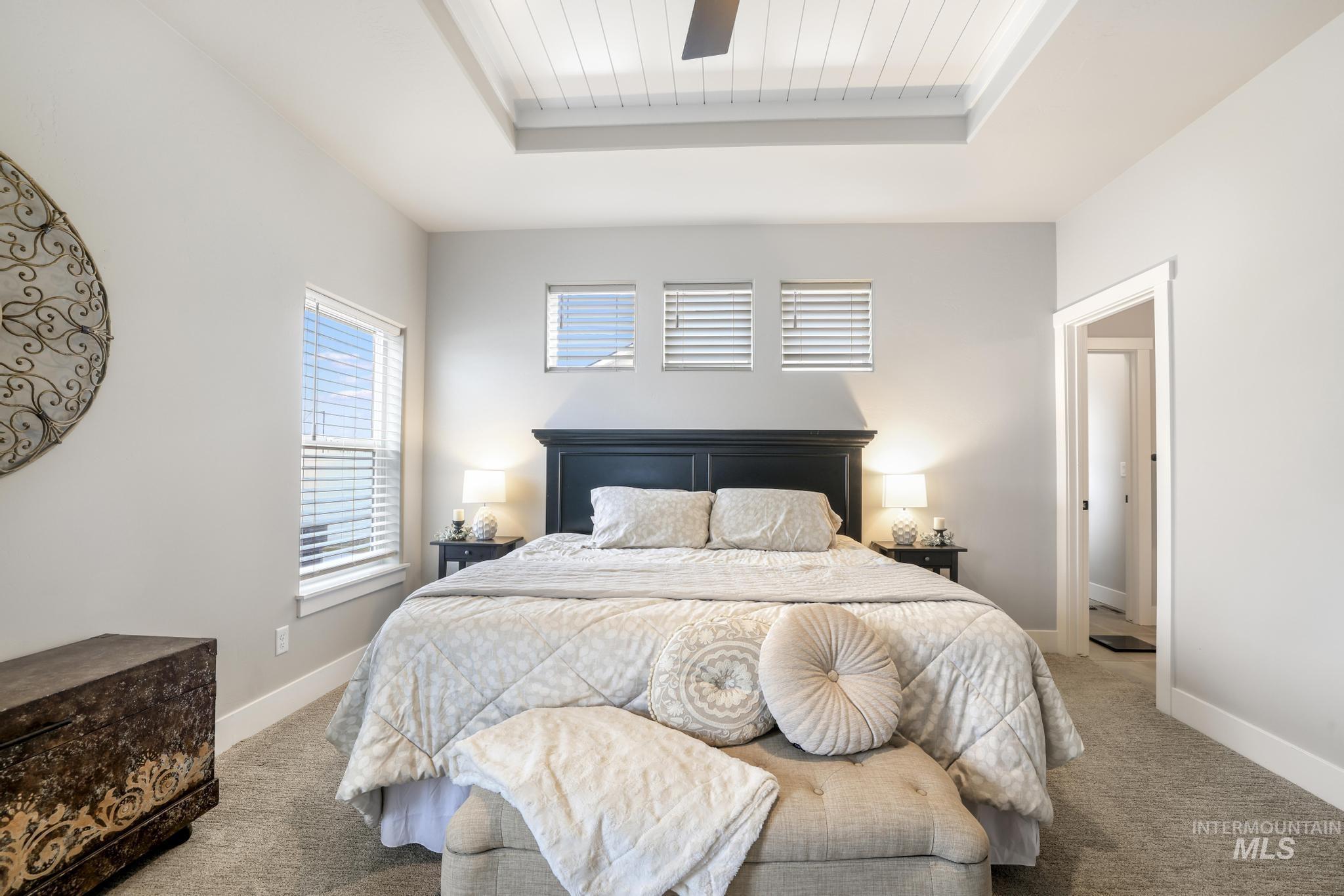 3103 Moonrise Road Twin Falls, ID 83301 - Photo 14 of 40 Bedroom with carpet and a tray ceiling