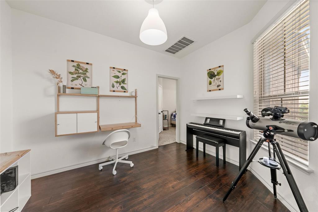 4756 Old Lorena Road Lorena, TX 76655 - Photo 16 of 39 a view of a workspace with furniture and a window