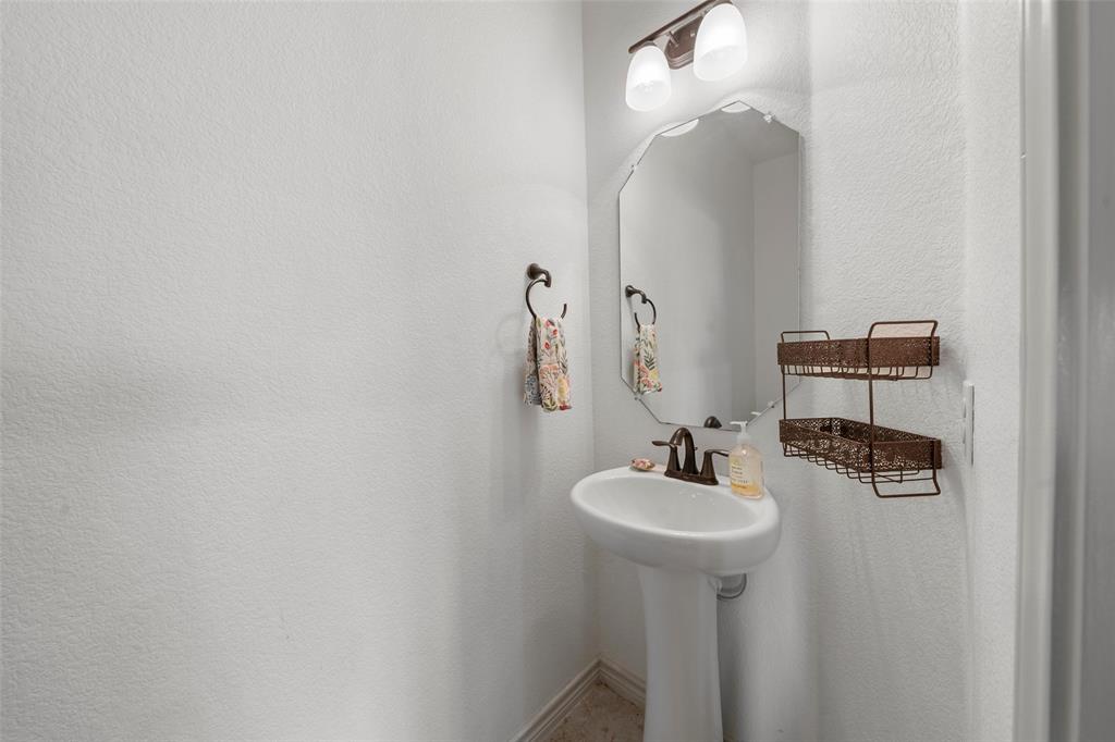 4756 Old Lorena Road Lorena, TX 76655 - Photo 27 of 39 a bathroom with a sink and a mirror