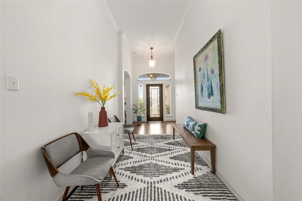 4756 Old Lorena Road Lorena, TX 76655 - Photo 3 of 39 a living room with furniture and a chandelier