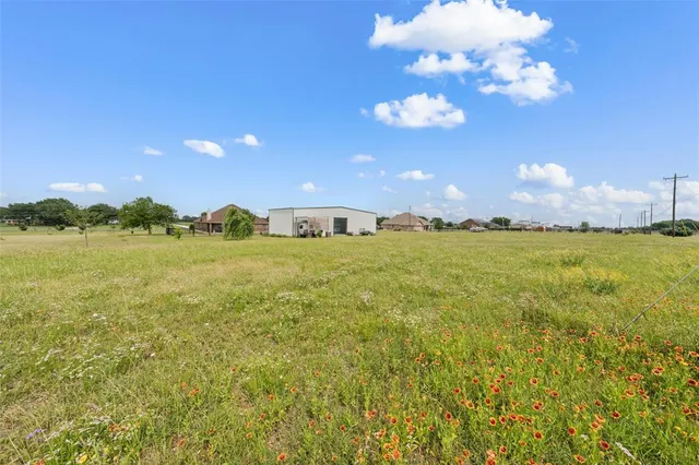 a view of a lake and sunset